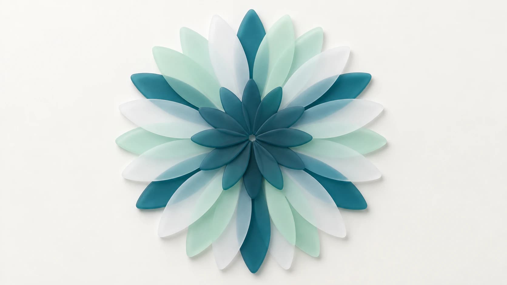 A radial rosette of overlapping matte petal shapes in deep teal, pale mint and cloudy white